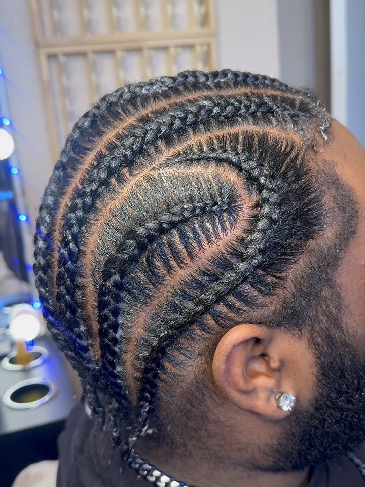 Creative curved cornrow design